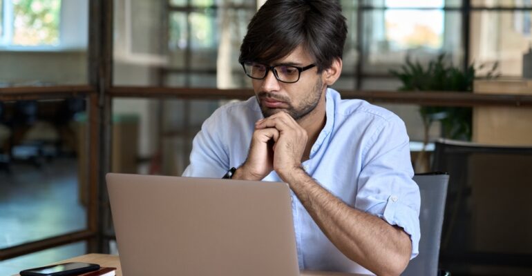 Career professional searching for jobs online in the AI era